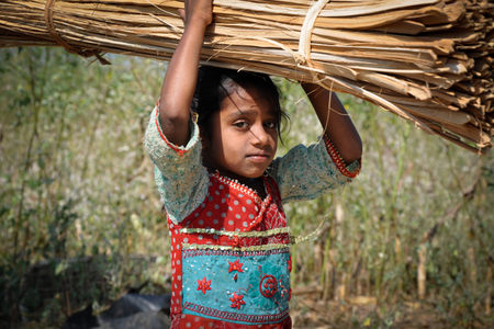 Young girl working outside